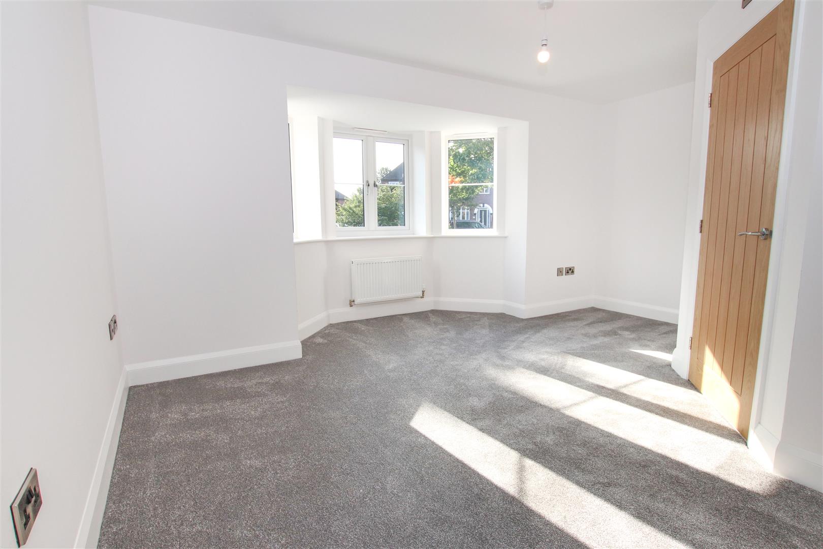 BEDROOM ONE (FRONT)